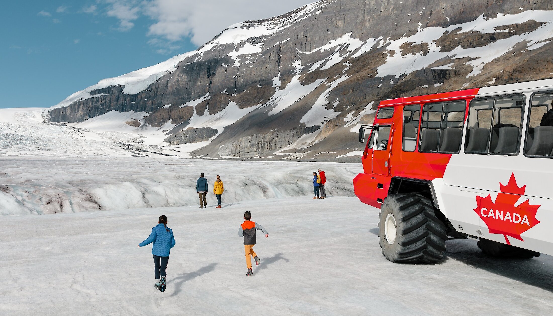 Visitors enjoying the Ice Explorer Tour on Athabasca Glacier