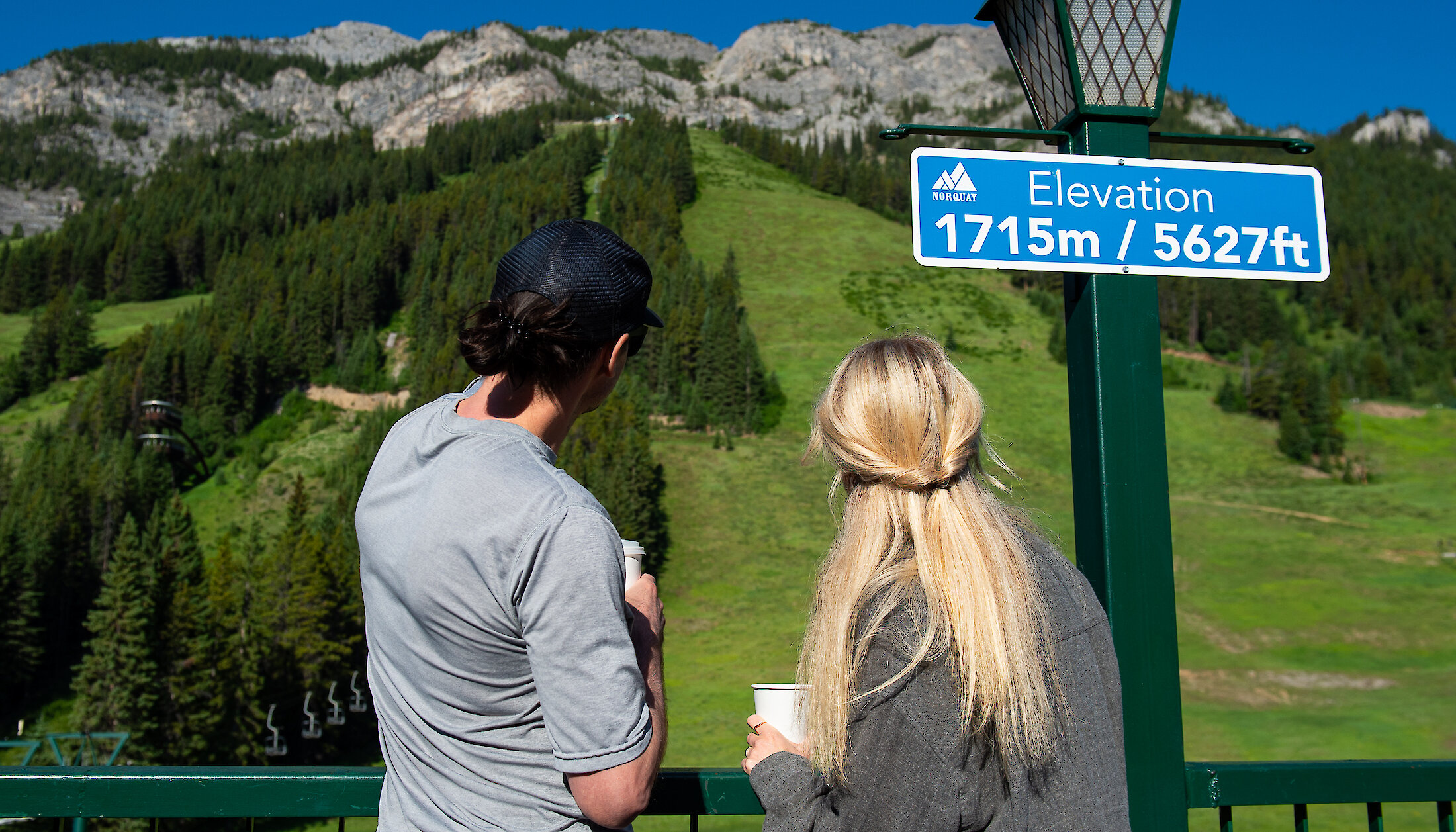 2 friends at the bottom of the Mount Norquay Chairlift