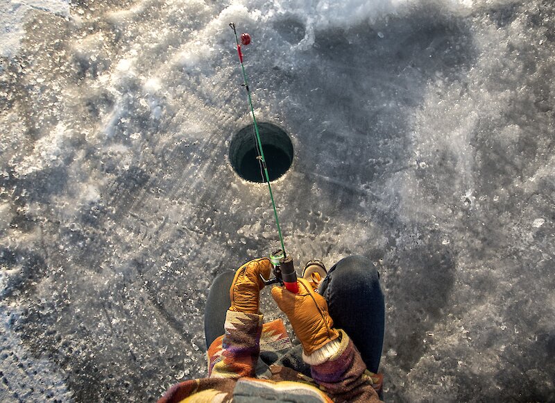 Ice fishing on spray lakes