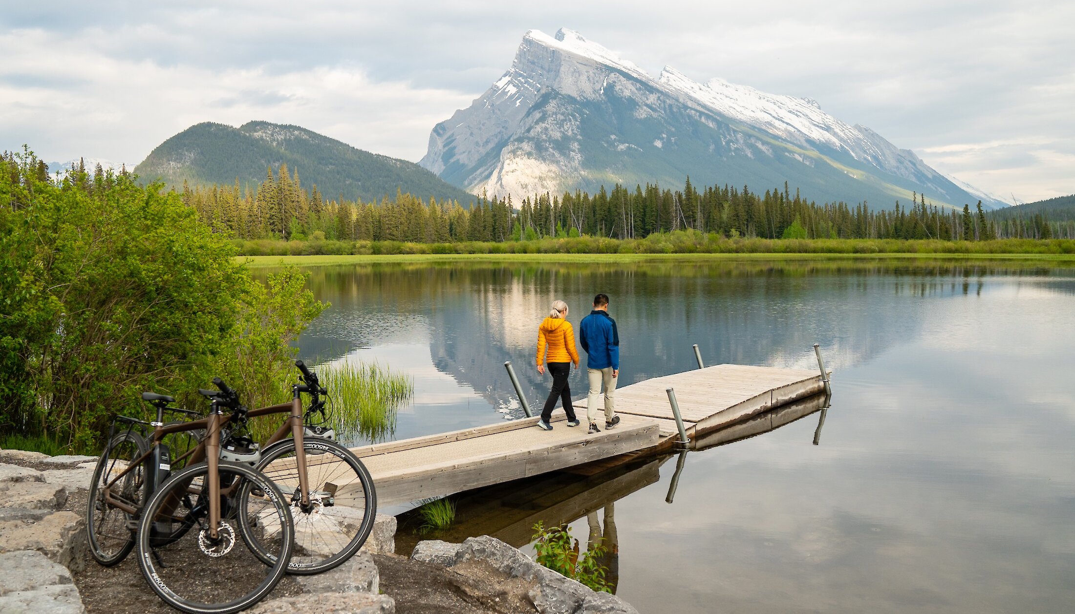 Couple enjoying a warm soak in the Banff Upper Hotsprings