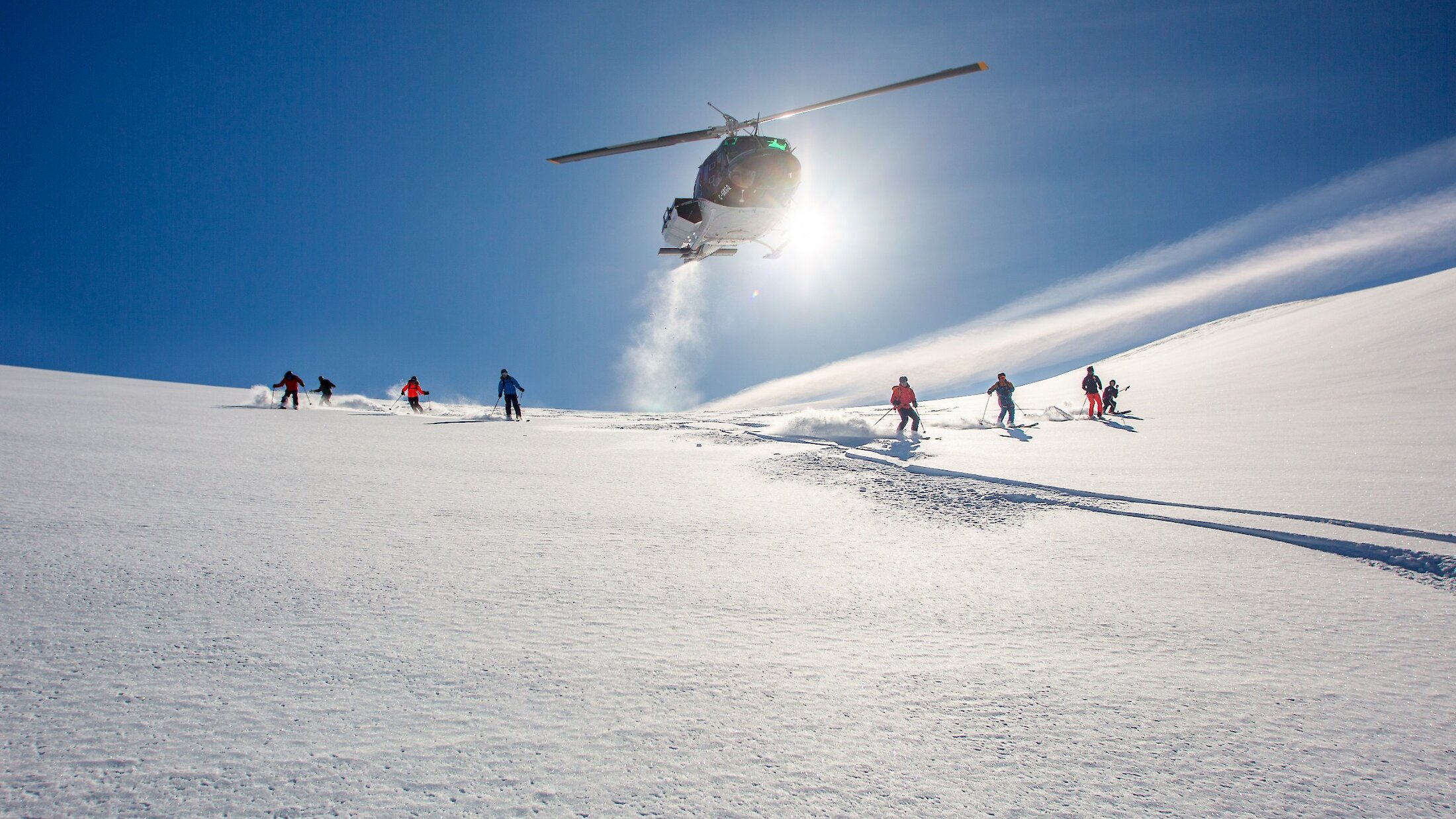 Heli-skiing flyover group formation