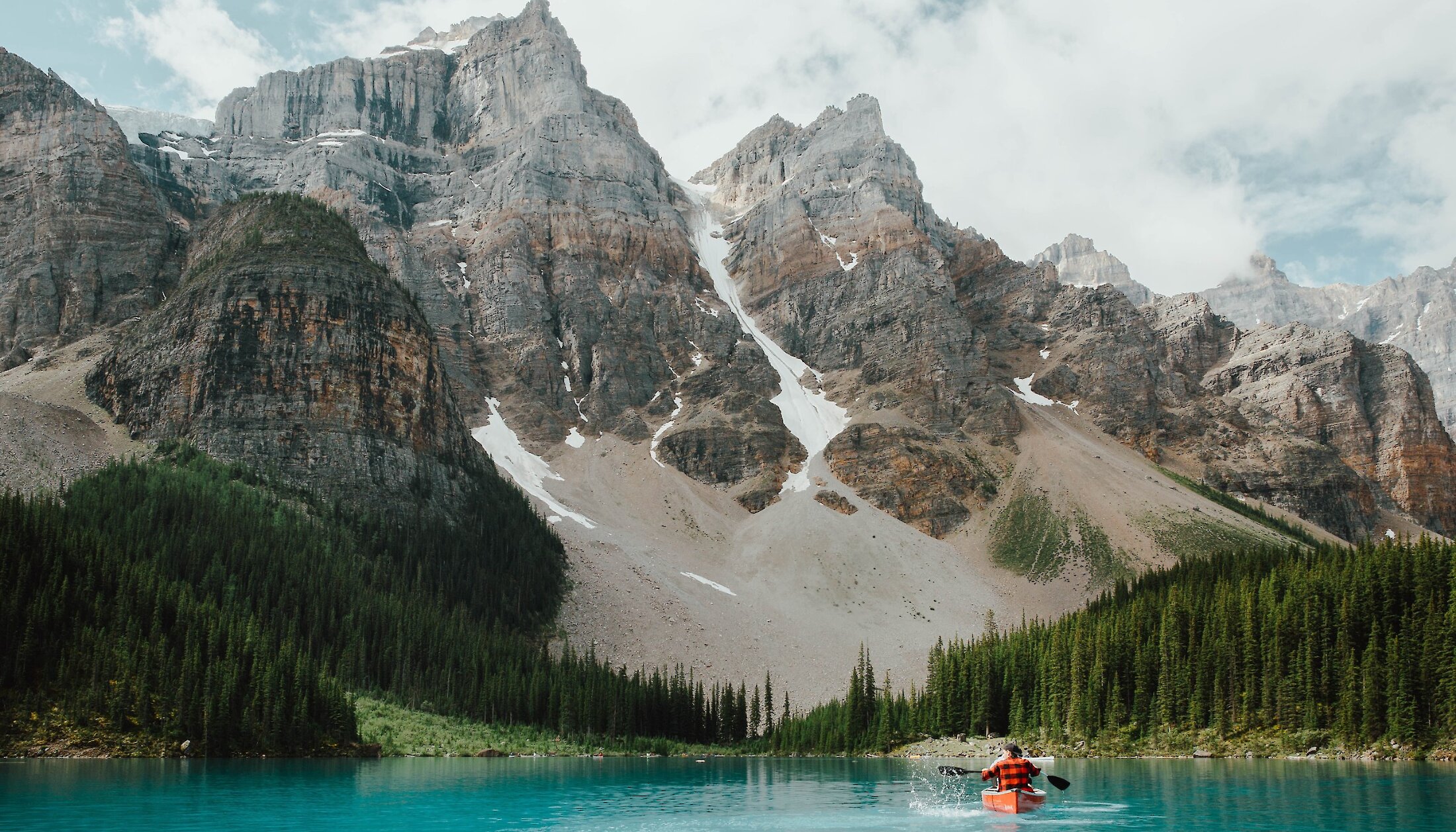 A couple canoeing on Moraine Lake