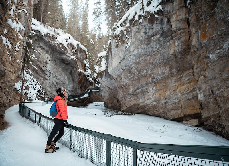 A woman taking in the view of Johnston Canyon in Banff National Park