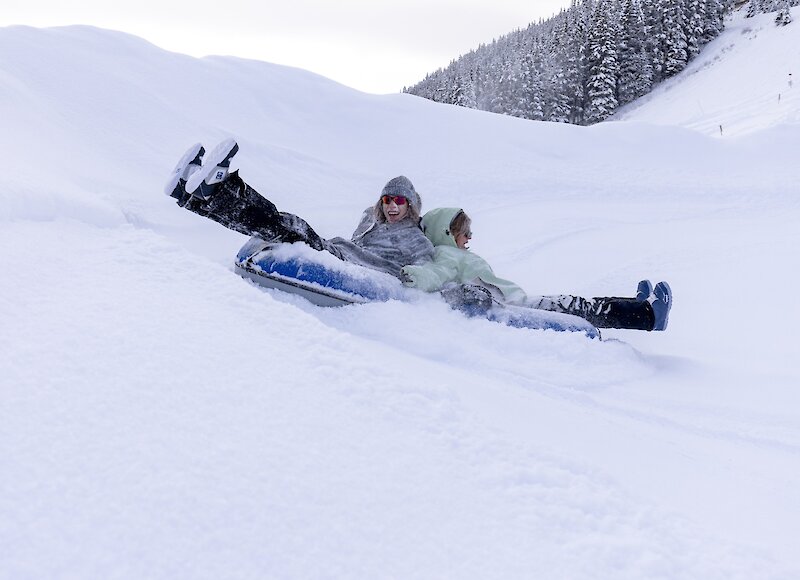 A snowy snow tubing at Mount Norquay