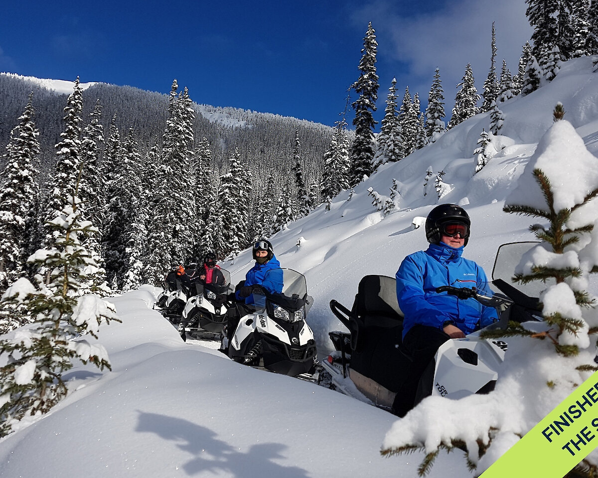 A group of snowmobilers on the trail in Golden