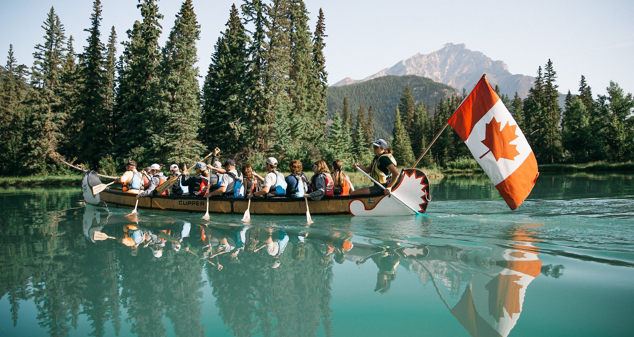 Paddle Along on a Voyageur Canoe Tour | Banff Adventures