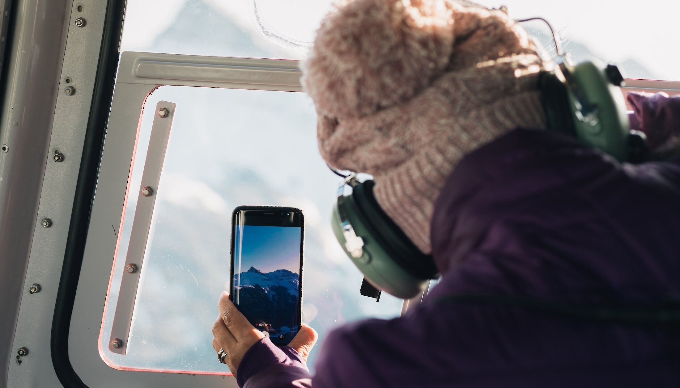 Get a bird's eye view of the Rocky Mountains from a helicopter